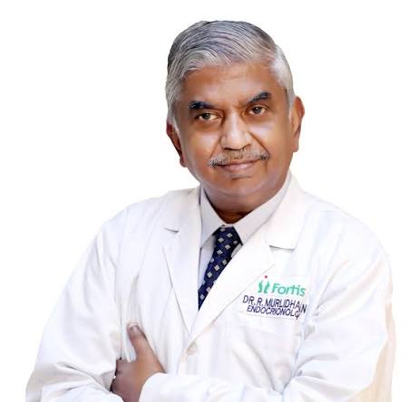 Dr Muralidharan